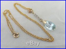 18ct/ 18k Diamond & Aquamarine Art deco design pendant on 9ct gold chain, 750,375