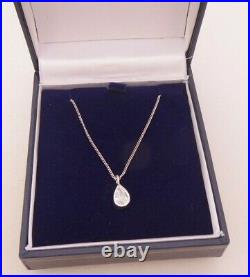 18ct gold 1/2ct pear drop diamond pendant on 9ct gold chain, boxed