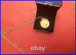 22ct GOLD HALF SOVEREIGN 1910 IN A 9ctGOLD MOUNT AND 9ct GOLD CHAIN