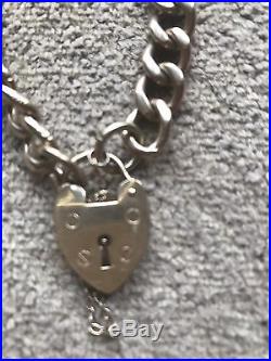 9 Ct Gold, Curb Chain Bracelet With Heart Padlock, 35.2 Grammes. Hallmarked