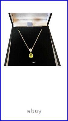 9 carat yellow gold peridot and diamond pendant with 9ct Yellow Gold Chain