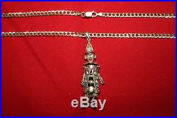 9ct Gold Articulated Clown pendant with Gemstone's On 24 Curb Chain 21.5g