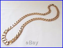 9ct Gold Curb Chain. 23 inch. Full English Hallmarks. 64 grams. 2 OZ Boxed