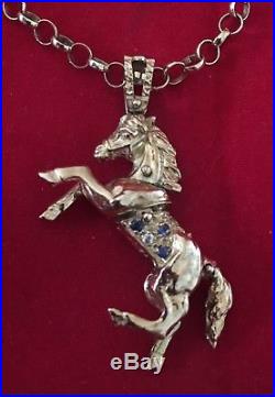 9ct Gold Horse Pendant On A Belcher chain 22