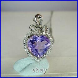 9ct WHITE GOLD AMETHYST & DIAMOND HEART PENDANT ON 18 GOLD CHAIN. A 21