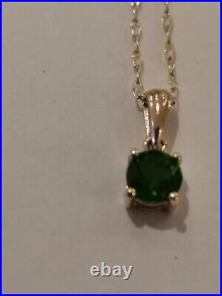 9ct gold chain and emerald Pendant
