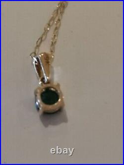 9ct gold chain and emerald Pendant