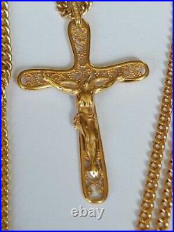 9ct gold curb chain and crucifix hallmarked. 375