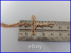 9ct gold curb chain and crucifix hallmarked. 375
