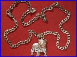 9ct white gold Bulldog Pendant on 9ct gold curb chain 13.10 grams