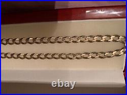 9k yellow gold solid curb 18 inch necklace. 12.64 grams. 5mm Wide. Hallmarked