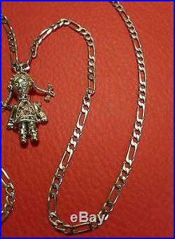 A Lovely 9ct gold Ragdoll on a lovely 9ct Gold 3 in 1 figaro chain
