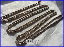Antique English long guard muff chain In 9ct gold